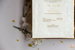 White Patterned Embossing with Gold Foil Name Booklet Invite